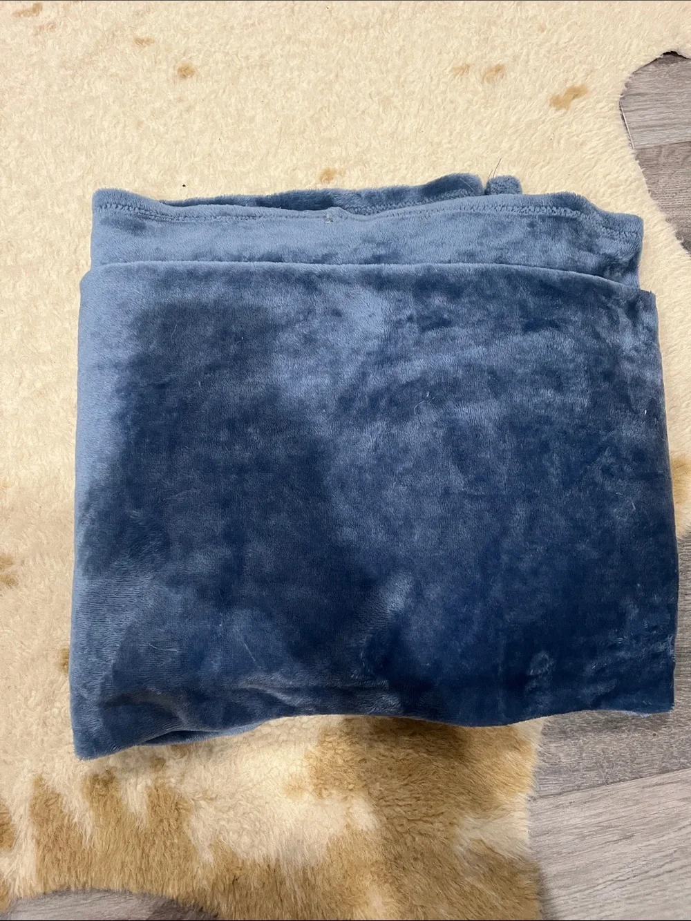 Soft, thin throw blanket. Blue.